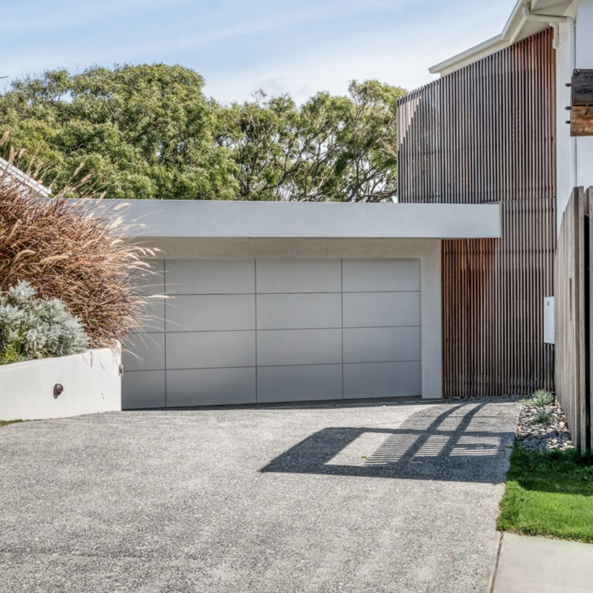 Danmar Ply Panel garage door with smooth plywood finish