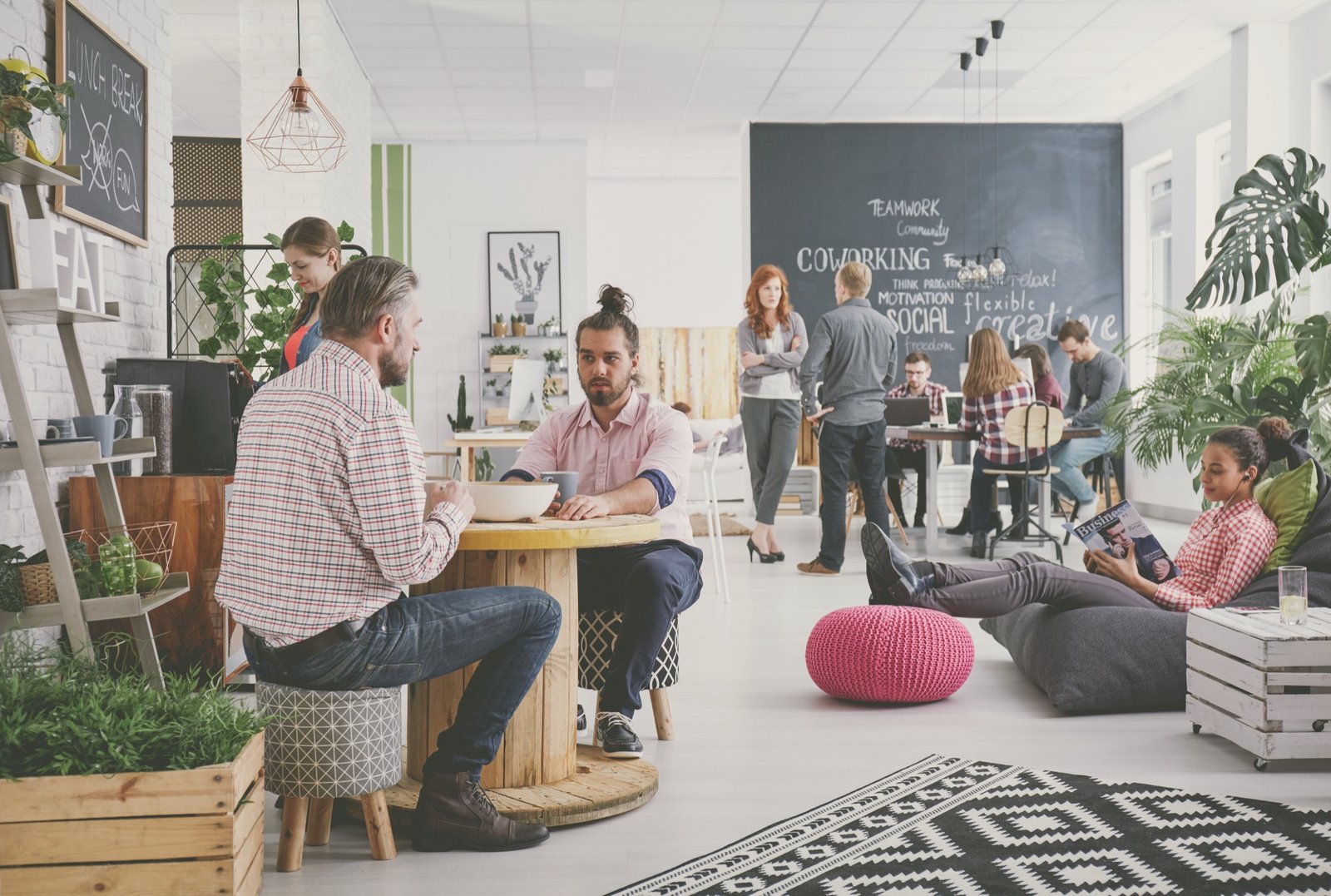 Team lead mentoring a new recruit at Best Doors